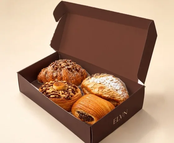 Four ELVN pastries in an open box